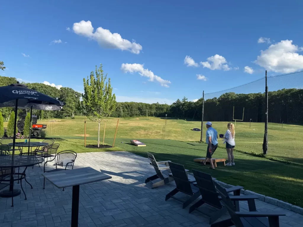 Patio overlooking the range at Southborough Golf Center, set up for private events